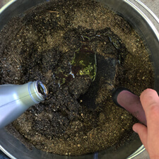 Garden Tool Bucket - Mixing Oil with Sand